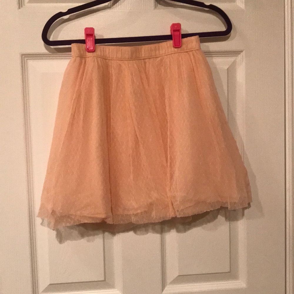 Peach skirt.